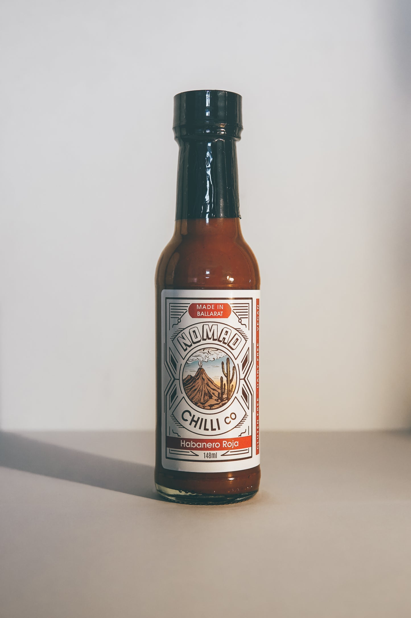 Fermented hot sauce Habanero and Mango Roja Hot Sauce front shot