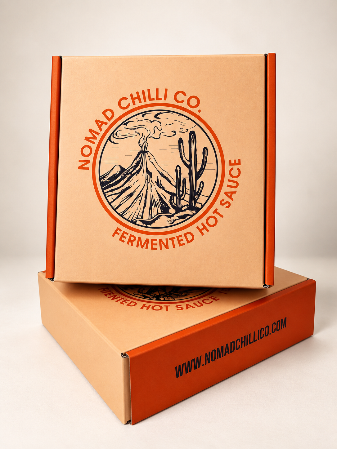 Nomad Chilli Co fermented hot sauce gift boxes with illustrated branded packaging