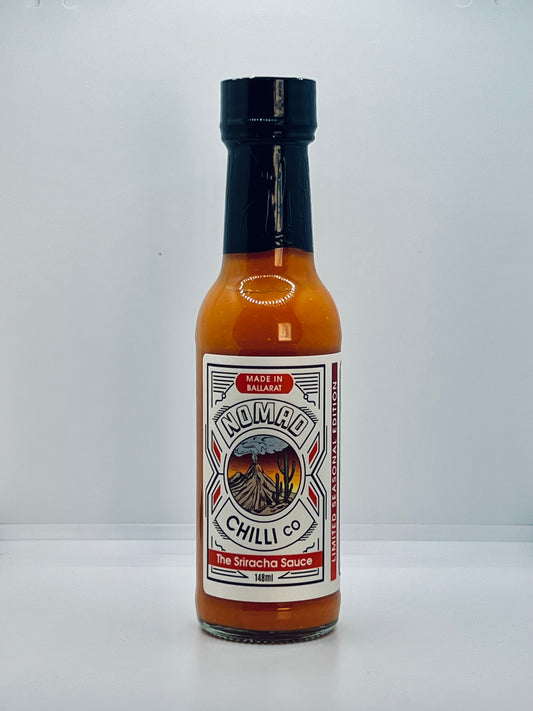 Bottle of Nomad Chilli Co Sriracha Sauce on a white background